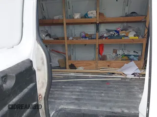 2014 Chevrolet Express Cargo Van with VIN 1GCSGAFX2E1121841, listed as a IAAI auction lot 42028712 with 164,768 mi miles. Bid and sale history available at carsss.com. Image 8.
