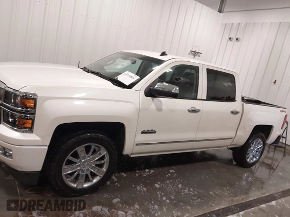 2014 Chevrolet Silverado 1500 High Country with VIN 3GCUKTEC4EG527722, listed as a IAAI auction lot 41978841 with 104,492 mi miles and . Bid and sale history available at DreamBid. Image 14.