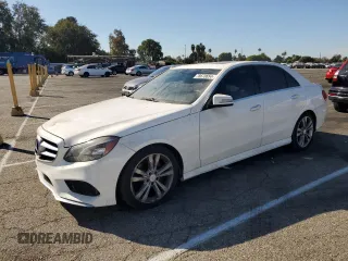 2014 Mercedes-Benz E 350 Sport with VIN WDDHF5KB9EA824728, listed as a Copart auction lot 78670654 with 169,236 mi miles and Salvage title. Bid and sale history available at DreamBid. Image 1.