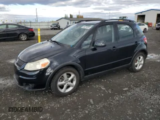 2009 Suzuki SX4 with VIN JS2YB413095103261, listed as a Copart auction lot 79321024 with 96,587 mi miles and Salvage Title. Bid and sale history available at carsss.com. Image 1.