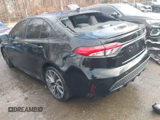 2021 Toyota Corolla SE with VIN 5YFS4MCE8MP061751, listed as a IAAI auction lot 40815693 with 80,450 mi miles. Bid and sale history available at carsss.com. Image 3.
