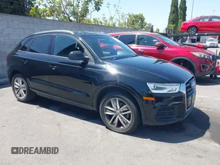 2017 Audi Q3 Premium with VIN WA1BCCFS2HR006765, listed as a IAAI auction lot 42526881 with 100,251 mi miles and . Bid and sale history available at DreamBid. Image 1.