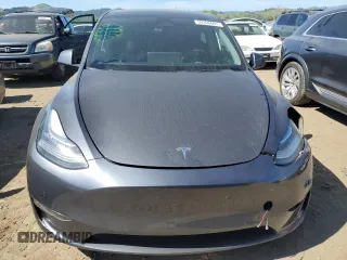 2022 Tesla Model Y Long Range with VIN 7SAYGDEE2NF402320, listed as a Copart auction lot 50396605 with 27,426 mi miles and Salvage Title. Bid and sale history available at DreamBid. Image 5.