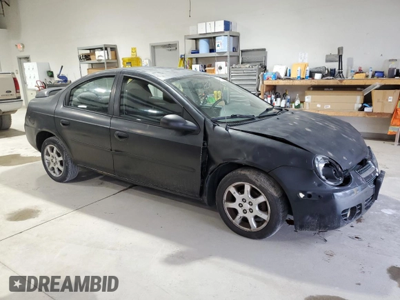 2004 Dodge Neon SXT with VIN 1B3ES56CX4D596703, listed as a Copart auction lot 51340445 with 184,207 mi miles and Salvage Title. Bid and sale history available at carsss.com. Image 4.