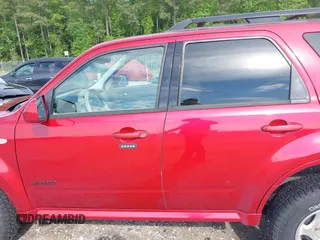 2008 Mercury Mariner Premier with VIN 4M2CU87158KJ12964, listed as a IAAI auction lot 42105891 with 202,194 mi miles and . Bid and sale history available at DreamBid. Image 14.