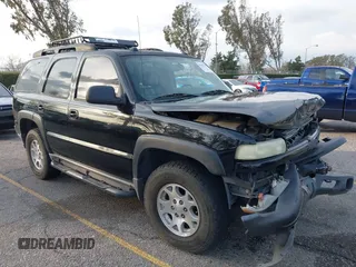 2004 Chevrolet Tahoe LS with VIN 1GNEK13T64R265302, listed as a IAAI auction lot 41445237 with 242,840 mi miles. Bid and sale history available at carsss.com. Image 1.