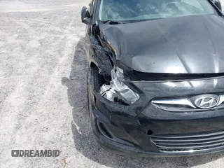 2014 Hyundai Accent GS with VIN KMHCT5AE7EU164658, listed as a IAAI auction lot 41911092 with 132,442 mi miles. Bid and sale history available at carsss.com. Image 6.