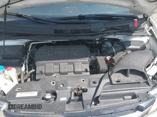 2014 Honda Odyssey EX-L with VIN 5FNRL5H63EB131596, listed as a IAAI auction lot 42402427 with 106,156 mi miles and . Bid and sale history available at DreamBid. Image 10.