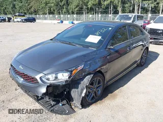 2021 Kia Forte GT-Line with VIN 3KPF34AD2ME418132, listed as a IAAI auction lot 42736894 with 58,901 mi miles and . Bid and sale history available at DreamBid. Image 2.