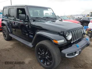 2023 Jeep Wrangler Sahara z VIN 1C4JJXP6XPW556327, wystawiony jako IAAI lot #41784532 z przebiegiem 39 918 mil mil oraz . Historia ofert i sprzedaży dostępna na DreamBid. Obrazek 1.