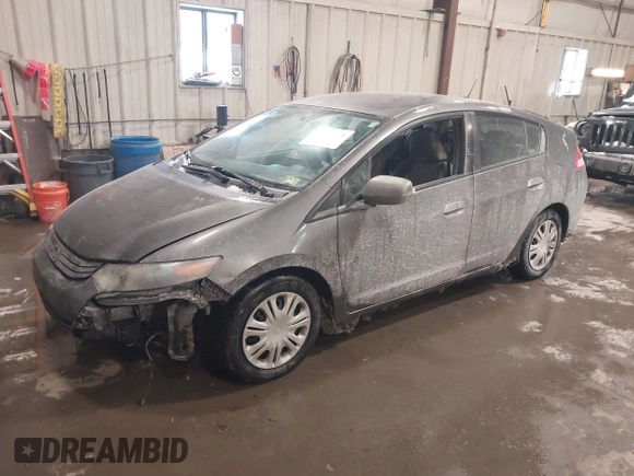 2011 Honda Insight with VIN JHMZE2H37BS004281, listed as a IAAI auction lot 41636305 with 273,063 mi miles and . Bid and sale history available at DreamBid. Image 2.