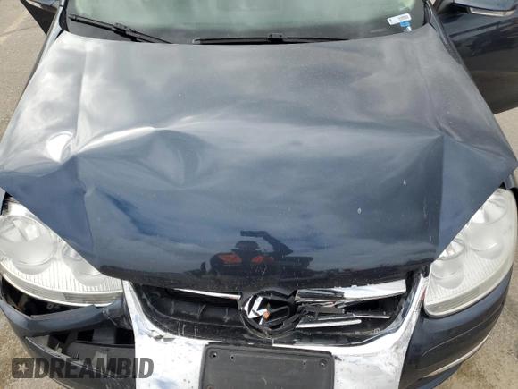 2010 Volkswagen Jetta Limited Edition with VIN 3VWRZ7AJ0AM099928, listed as a Copart auction lot 57291895 with 118,451 mi miles and Salvage title. Bid and sale history available at DreamBid. Image 11.