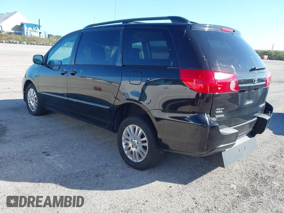 2009 Toyota Sienna XLE with VIN 5TDZK22C59S235573, listed as a IAAI auction lot 40885143 with 62,949 mi miles. Bid and sale history available at carsss.com. Image 3.
