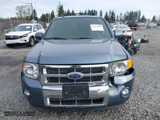 2010 Ford Escape Limited with VIN 1FMCU9EG1AKB89593, listed as a IAAI auction lot 41993888 with 121,175 mi miles. Bid and sale history available at carsss.com. Image 12.