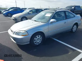 1996 Honda Civic EX with VIN 1HGEJ8249TL090500, listed as a IAAI auction lot 41927643 with 164,067 mi miles. Bid and sale history available at carsss.com. Image 2.