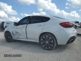 2019 BMW X6 xDrive35i with VIN 5UXKU2C5XK0Z63599, listed as a Copart auction lot 44612065 with 105,898 mi miles and Non Repairable. Bid and sale history available at carsss.com. Image 2.