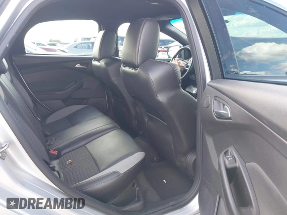 2014 Ford Focus ST with VIN 1FADP3L92EL349942, listed as a IAAI auction lot 41742097 with 141,540 mi miles and . Bid and sale history available at carsss.com. Image 8.