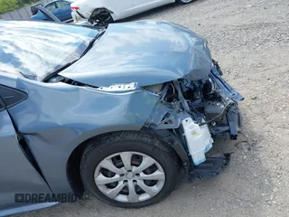 2021 Toyota Corolla LE with VIN JTDEPMAE7MJ144664, listed as a IAAI auction lot 42269698 with 23,500 mi miles and . Bid and sale history available at DreamBid. Image 18.