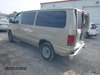 2011 Ford Econoline Passenger XL with VIN 1FBNE3BLXBDA21972, listed as a IAAI auction lot 41151236 with 395,453 mi miles. Bid and sale history available at carsss.com. Image 3.