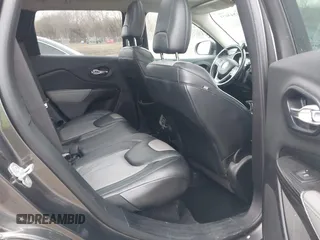 2014 Jeep Cherokee Limited with VIN 1C4PJMDS3EW137985, listed as a IAAI auction lot 41543651 with 131,312 mi miles. Bid and sale history available at carsss.com. Image 8.