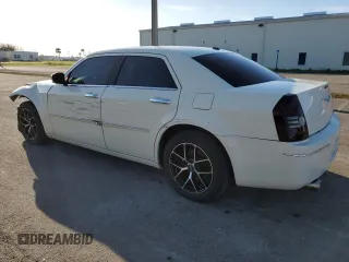 2010 Chrysler 300 Touring with VIN 2C3CA5CV8AH152107, listed as a Copart auction lot 75115264 with 124,995 mi miles and Salvage Title. Bid and sale history available at carsss.com. Image 2.