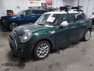 2015 MINI Hardtop 4 Door S z VIN WMWXU3C55FT892293, wystawiony jako IAAI lot #41359066 z przebiegiem 112 704 mil mil oraz . Historia ofert i sprzedaży dostępna na DreamBid. Obrazek 17.