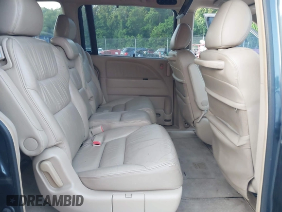 2005 Honda Odyssey EX-L with VIN 5FNRL38605B406281, listed as a IAAI auction lot 42582488 with 185,862 mi miles and . Bid and sale history available at DreamBid. Image 8.