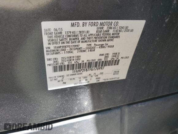 2015 Ford Taurus Limited z VIN 1FAHP2F87FG170997, wystawiony jako Copart lot #54346554 z przebiegiem Nie podano mil oraz Szkoda całkowita • Salvage title. Historia ofert i sprzedaży dostępna na DreamBid. Obrazek 12.