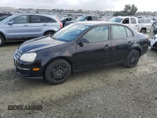 2009 Volkswagen Jetta S z VIN 3VWJZ71K99M049465, wystawiony jako Copart lot #84696904 z przebiegiem 98 631 mil mil oraz Szkoda całkowita • Salvage title. Historia ofert i sprzedaży dostępna na DreamBid. Obrazek 1.