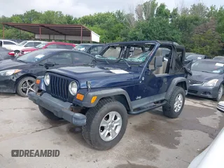 2006 Jeep Wrangler SE with VIN 1J4FA29156P739521, listed as a IAAI auction lot 42563566 with 117,281 mi miles and . Bid and sale history available at DreamBid. Image 14.