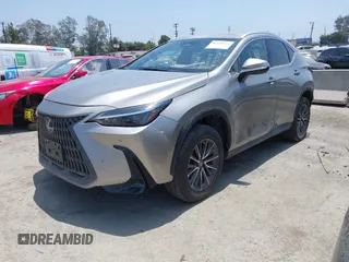2022 Lexus NX 350 Premium z VIN 2T2GGCEZ1NC008202, wystawiony jako IAAI lot #42438898 z przebiegiem 14 729 mil mil oraz . Historia ofert i sprzedaży dostępna na DreamBid. Obrazek 20.