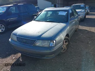 1998 Toyota Avalon XL with VIN 4T1BF18BXWU250149, listed as a IAAI auction lot 41568370 with 299,990 mi miles and . Bid and sale history available at DreamBid. Image 6.