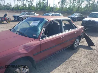 1991 Toyota Camry DLX z VIN 4T1SV21E0MU347371, wystawiony jako IAAI lot #42048695 z przebiegiem 209 451 mil mil oraz . Historia ofert i sprzedaży dostępna na DreamBid. Obrazek 6.