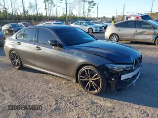 2022 BMW 3 Series M340i with VIN 3MW5U7J01N8C65375, listed as a IAAI auction lot 41688228 with 36,513 mi miles. Bid and sale history available at carsss.com. Image 1.
