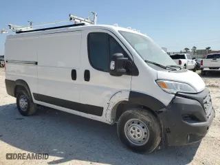 2023 Ram ProMaster Cargo Van with VIN 3C6LRVAG9PE545344, listed as a Copart auction lot 52437975 with 11,569 mi miles and Salvage Title. Bid and sale history available at carsss.com. Image 4.