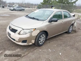 2010 Toyota Corolla with VIN 1NXBU4EE7AZ297198, listed as a IAAI auction lot 42080980 with 142,176 mi miles. Bid and sale history available at carsss.com. Image 2.