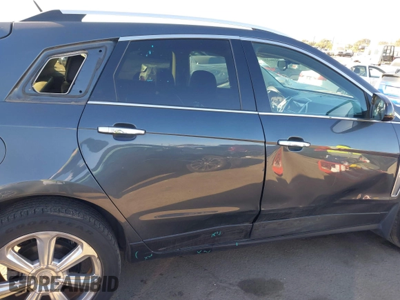 2013 Cadillac SRX Premium Collection z VIN 3GYFNEE37DS525612, wystawiony jako IAAI lot #41344221 z przebiegiem 119 573 mil mil oraz . Historia ofert i sprzedaży dostępna na DreamBid. Obrazek 6.