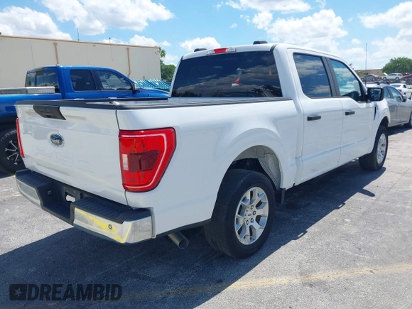 2023 Ford F-150 XL with VIN 1FTEW1C54PKD83361, listed as a IAAI auction lot 42236338 with 35,902 mi miles and . Bid and sale history available at DreamBid. Image 4.
