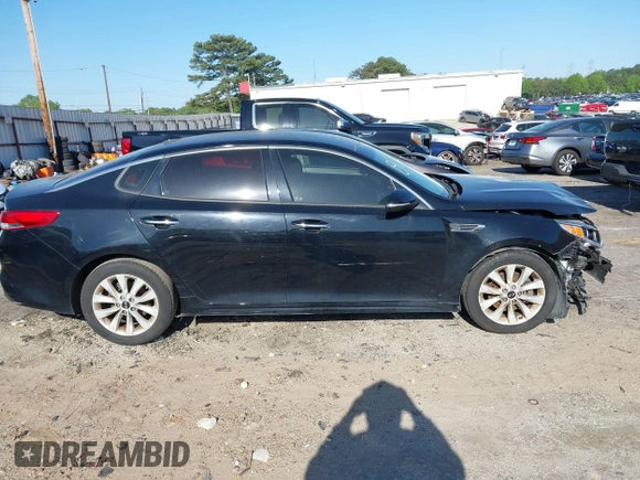 2016 Kia Optima EX z VIN 5XXGU4L35GG066083, wystawiony jako IAAI lot #41828804 z przebiegiem 112 396 mil mil oraz . Historia ofert i sprzedaży dostępna na DreamBid. Obrazek 13.