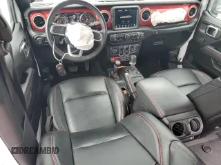 2023 Jeep Wrangler Rubicon with VIN 1C4JJXFM3PW585720, listed as a Copart auction lot 59776305 with 19,190 mi miles and Salvage title. Bid and sale history available at DreamBid. Image 8.