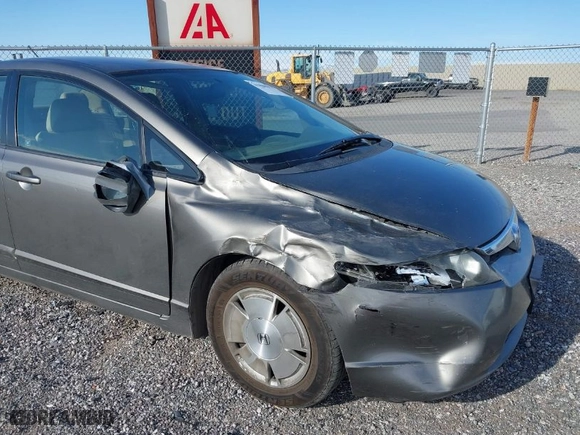 2007 Honda Civic Hybrid with VIN JHMFA36257S011770, listed as a IAAI auction lot 41888871 with 205,583 mi miles. Bid and sale history available at carsss.com. Image 6.