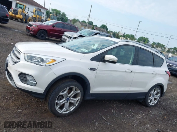 2019 Ford Escape Titanium with VIN 1FMCU9J97KUA03195, listed as a IAAI auction lot 42656589 with 40,099 mi miles and . Bid and sale history available at DreamBid. Image 14.