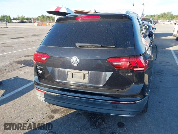 2018 Volkswagen Tiguan SEL Premium with VIN 3VV5B7AX1JM002585, listed as a IAAI auction lot 40495823 with 82,376 mi miles and . Bid and sale history available at DreamBid. Image 17.