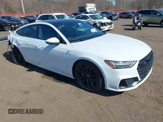 2023 Audi A7 z VIN WAUU2BF24PN040320, wystawiony jako IAAI lot #42055640 z przebiegiem 32 330 mil mil oraz . Historia ofert i sprzedaży dostępna na DreamBid. Obrazek 1.
