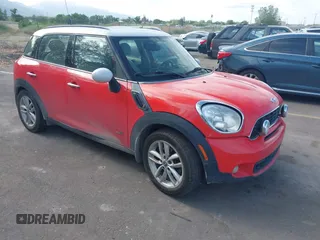 2012 MINI Countryman S z VIN WMWZC5C54CWM13041, wystawiony jako IAAI lot #42244303 z przebiegiem 139 733 mil mil oraz . Historia ofert i sprzedaży dostępna na DreamBid. Obrazek 1.
