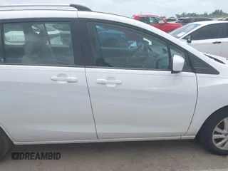 2012 Mazda 5 Sport with VIN JM1CW2BLXC0114770, listed as a IAAI auction lot 42147656 with 99,908 mi miles and . Bid and sale history available at DreamBid. Image 13.