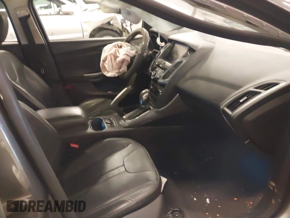 2013 Ford Focus Titanium with VIN 1FADP3J23DL265049, listed as a IAAI auction lot 41765621 with 100,550 mi miles and . Bid and sale history available at carsss.com. Image 5.