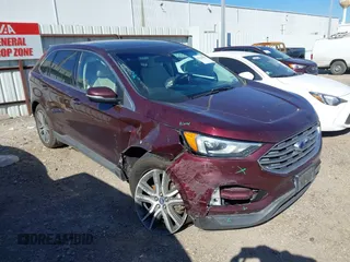 2019 Ford Edge Titanium z VIN 2FMPK3K94KBB41673, wystawiony jako IAAI lot #41762692 z przebiegiem 82 812 mil mil oraz . Historia ofert i sprzedaży dostępna na DreamBid. Obrazek 1.