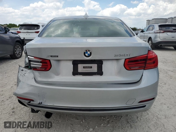 2018 BMW 3 Series 330i xDrive with VIN WBA8D9C50JEM33631, listed as a Copart auction lot 57595925 with 96,582 mi miles and Salvage title. Bid and sale history available at DreamBid. Image 6.
