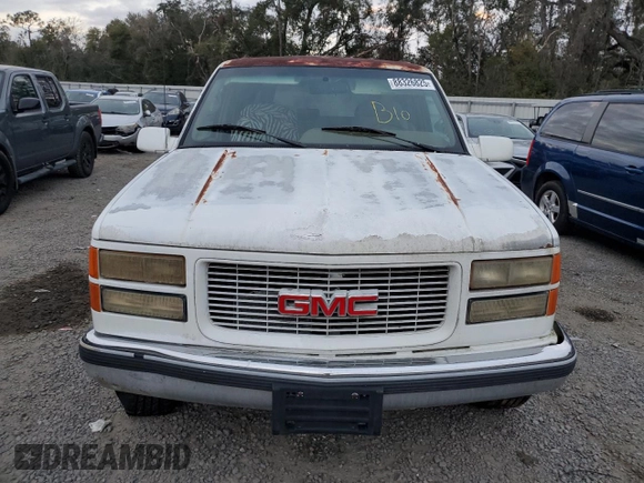 1995 GMC Suburban z VIN 1GKFK16K3SJ704911, wystawiony jako Copart lot #88326825 z przebiegiem 191 006 mil mil oraz Szkoda całkowita • Salvage title. Historia ofert i sprzedaży dostępna na DreamBid. Obrazek 5.
